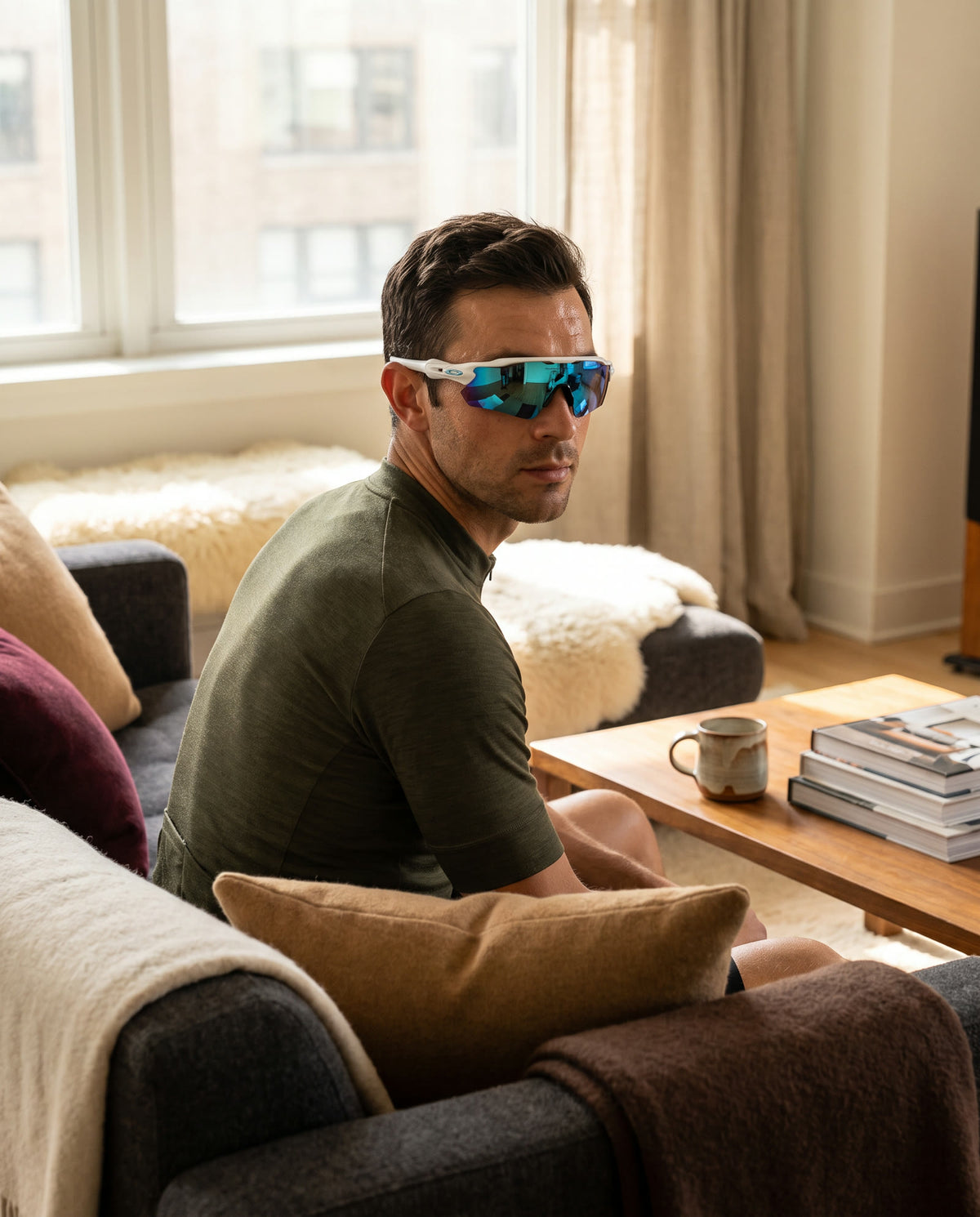 Man wearing the Sport Polarized Sunglasses in a sunlit room